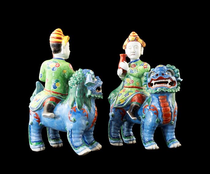 GG: Pair of Chinese porcelain famille rose figures of riders on Buddhist lions | MasterArt